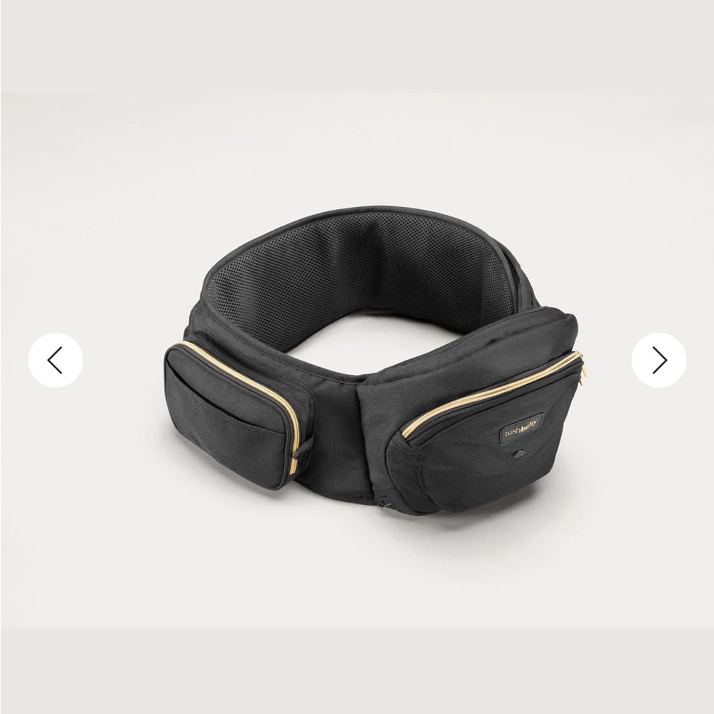 Black and gold Tushbaby carrier